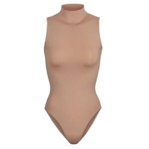 SKIMS Sleeveless Mock Neck Bodysuit in Nude